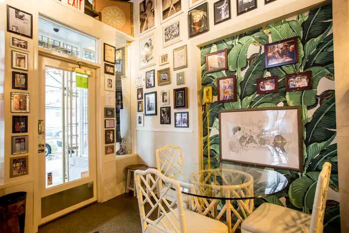 The interior of Rue La Rue Cafe, which features original wallpapering and the telephone from 'Golden Girls'  <br/>